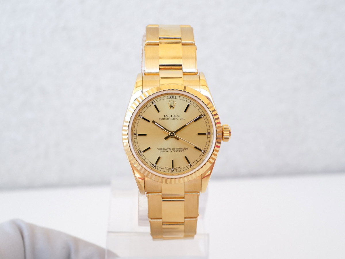 Купить часы Rolex Oyster Perpetual 31 Champagne Dial 18K Yellow Gold